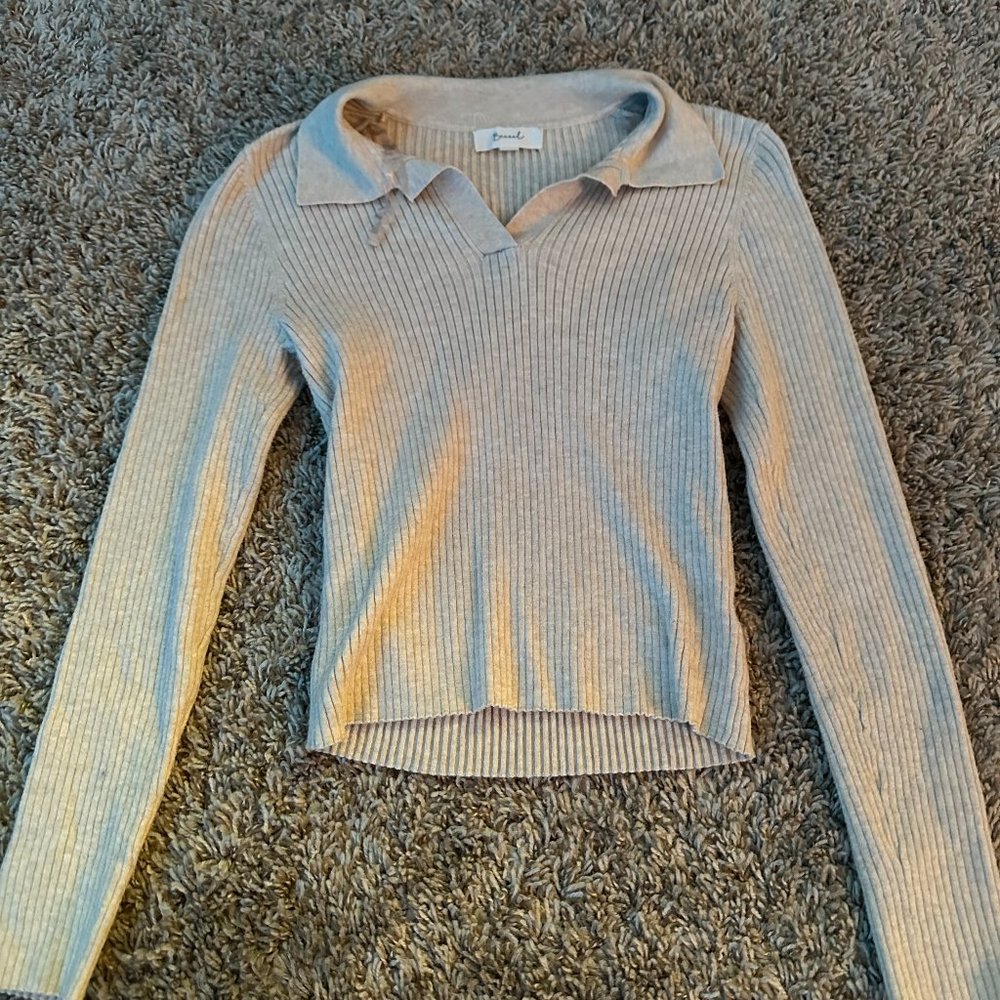 Cream colored long sleeve collared sweater